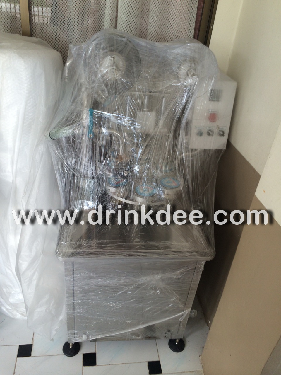 เครื่องบรรจุน้ำแก้ว (กึ่งอัตโนมัติ)