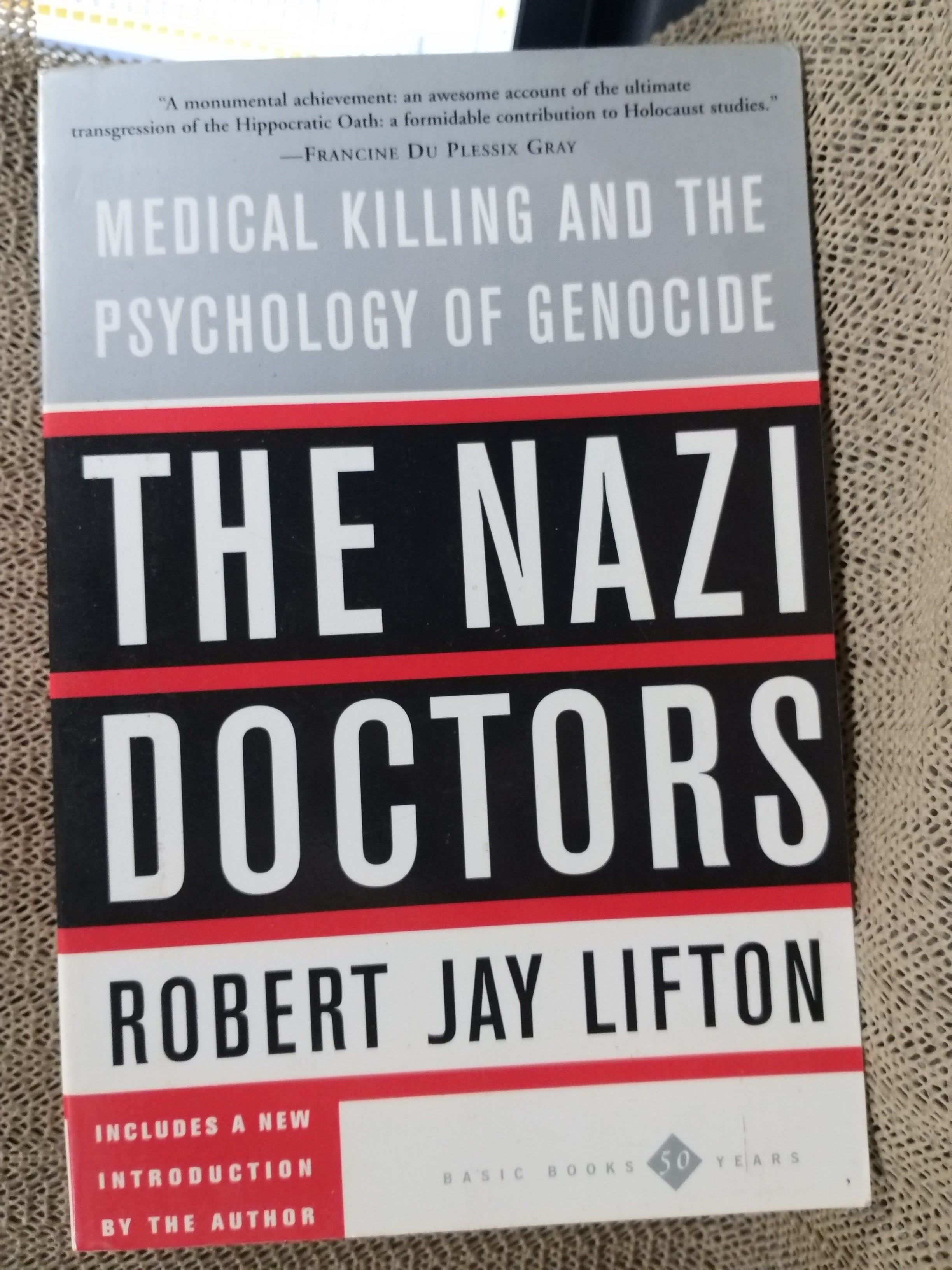 The Nazi Doctors: Medical Killing and the Psychology of Genocide Paperback by Robert Jay Lifton (Author)