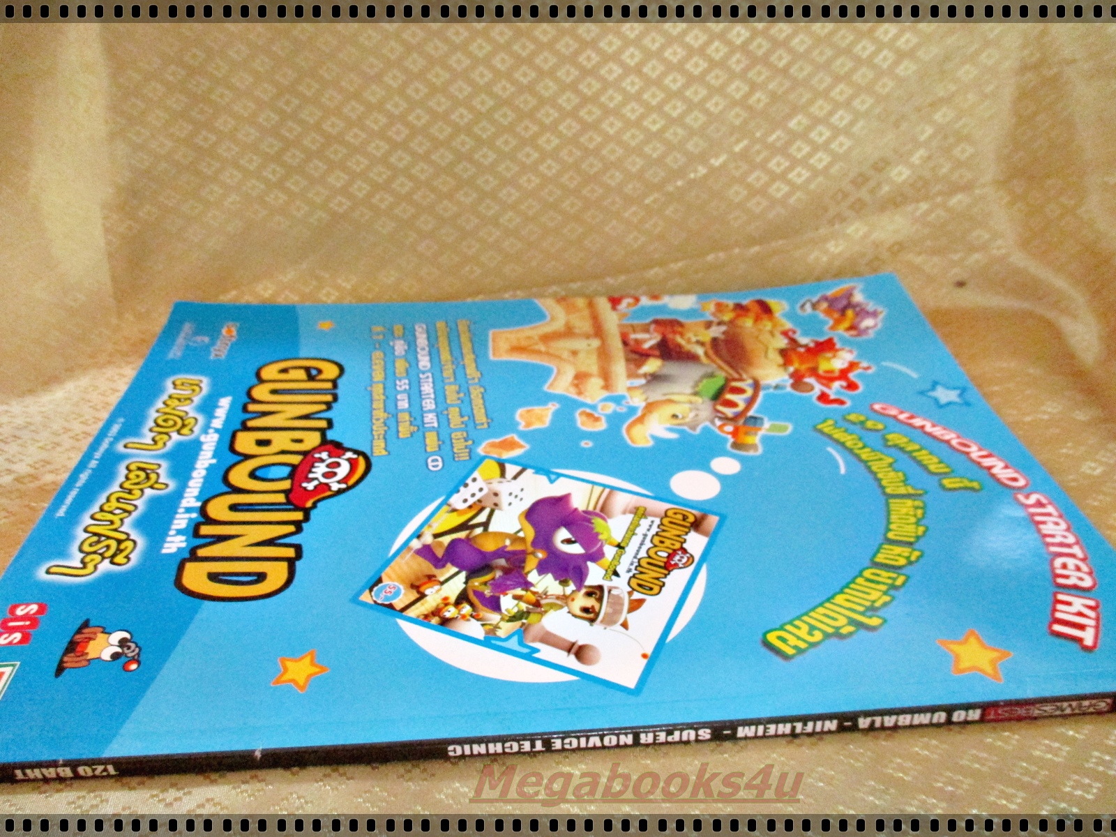 หนังสือคู่มือเกมส์ RO UMBALA SUPER NOVICE TECHNIC ตำหนิมีรอยมีดตัดยาวที่หน้าปก ตามรูป