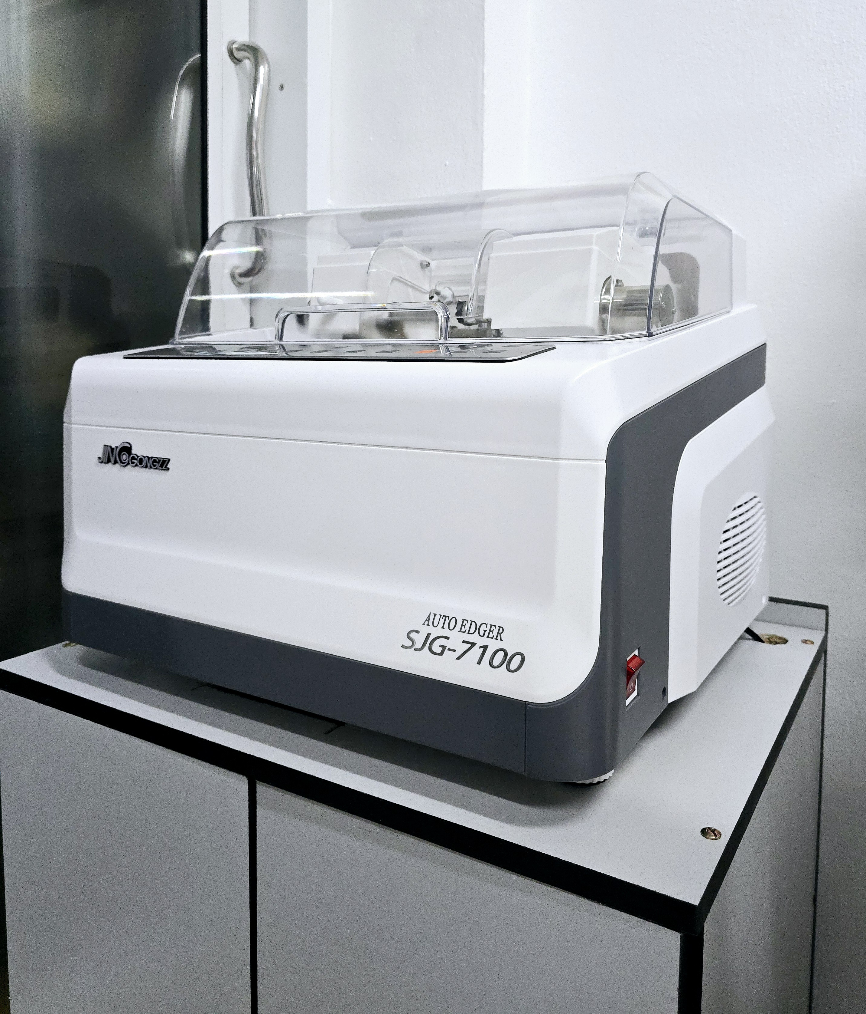 เครื่องฝนเลนส์ออโต้ระบบอัตโนมัติ Automatic Lens edger SJG-7100 ฝนเลนส์ PC CR GL ขัดเงาสันเลนส์กรอบเซาะ