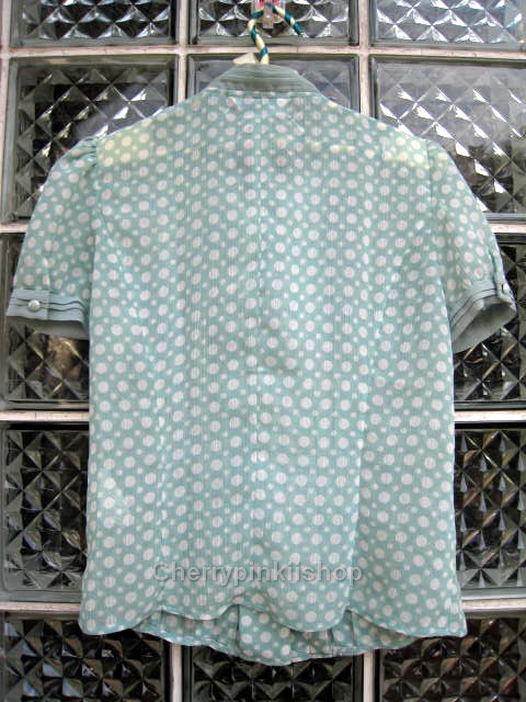 เสื้อแฟชั่นสีเขียวอ่อน ลาย Polka dot ลายจุด ผูกโบว์ที่ด้านหน้า เนื้อผ้าบางสวมใส่สบาย ยี่ห้อ Karen