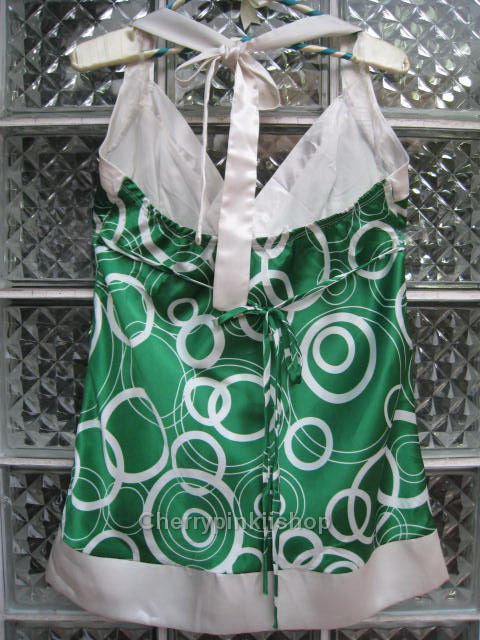 เสื้อแฟชั่นสีเขียวลายวงกลม สายเดี่ยว ผ้ามันลื่น นิ่ม สวยดูดี ผูกโบว์ที่ต้นคอด้านหลัง Made in USA