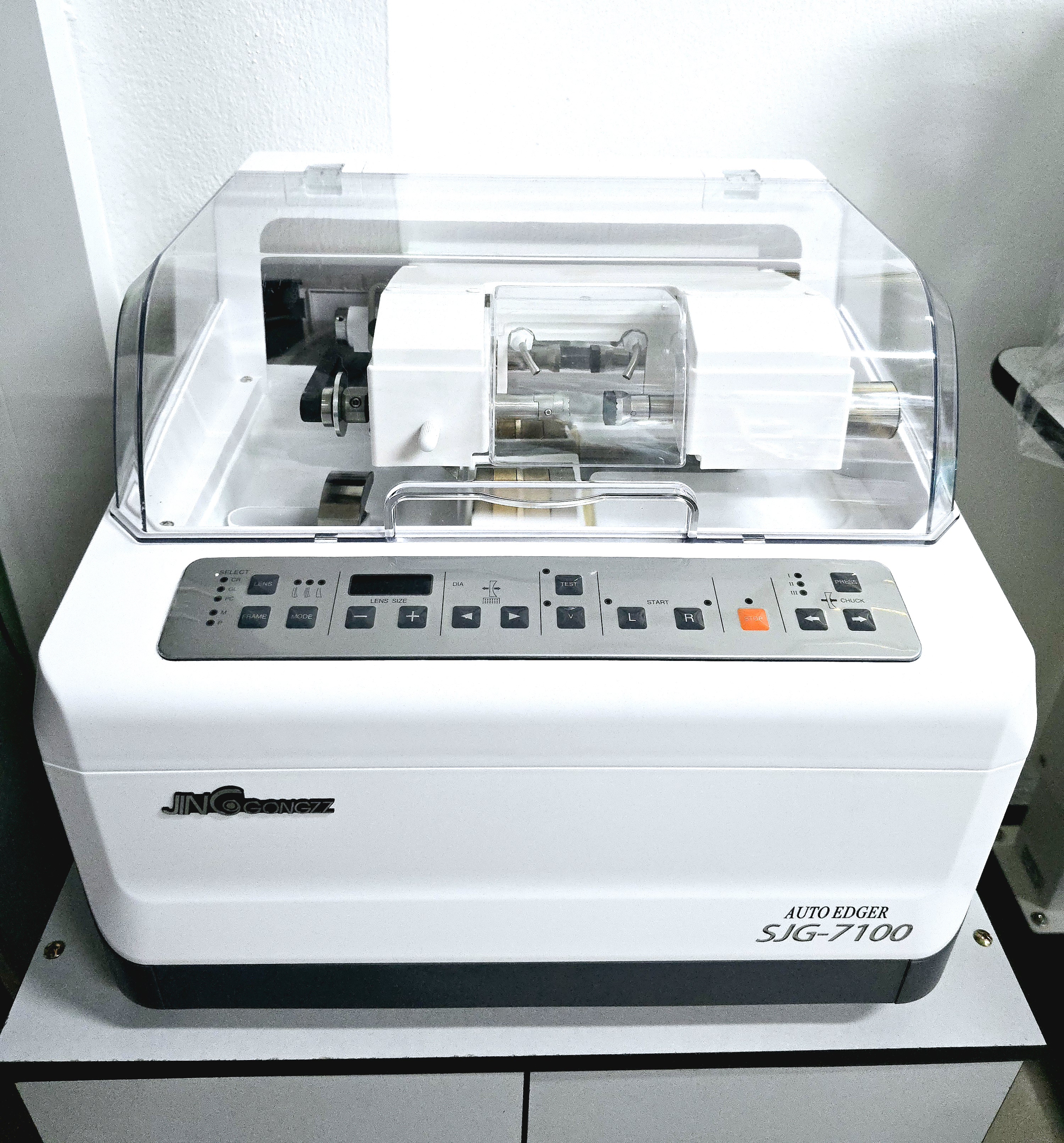 เครื่องฝนเลนส์ออโต้ระบบอัตโนมัติ Automatic Lens edger SJG-7100 ฝนเลนส์ PC CR GL ขัดเงาสันเลนส์กรอบเซาะ