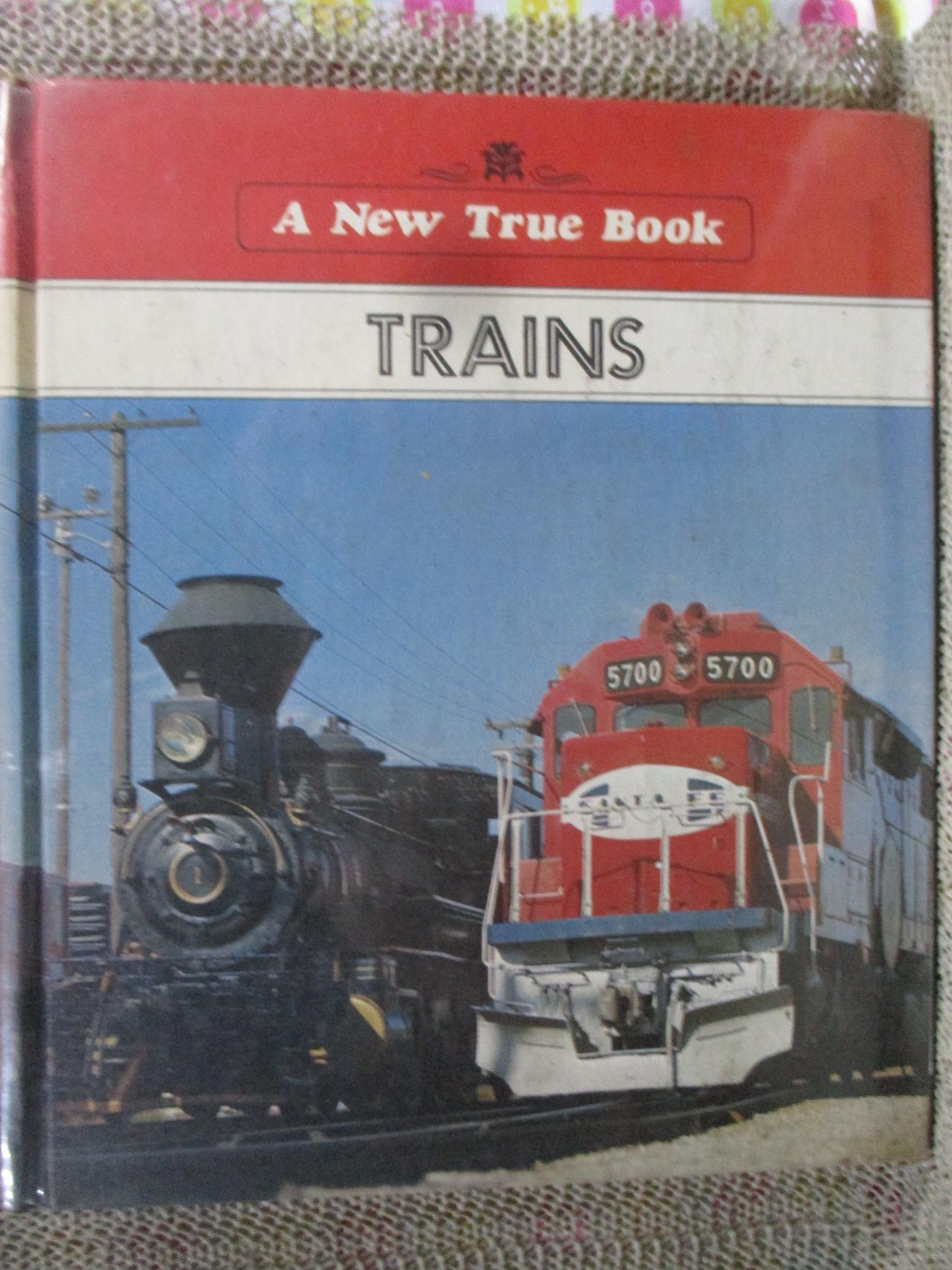 หนังสือ A New True Book : TRAINS (ภาษาอังกฤษ) กระดาษมีจุดเหลือง สภาพดี ห่อปกพลาสติก