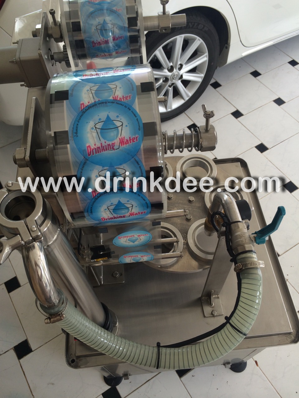 เครื่องบรรจุน้ำแก้ว (กึ่งอัตโนมัติ)