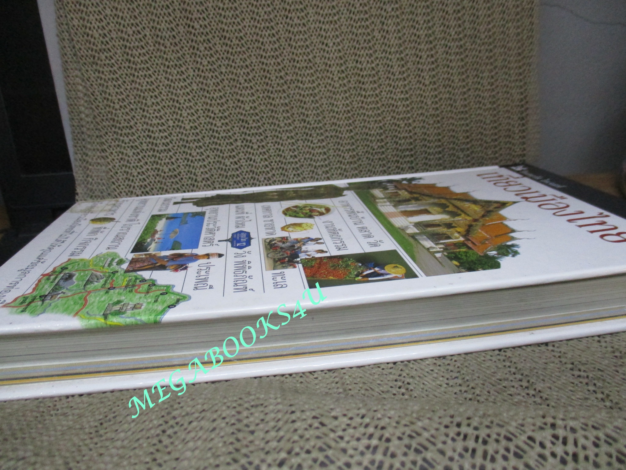 หนังสือ เที่ยวเมืองไทย : รีดเดอร์ส ไดเจสท์ (ปกแข็ง) มีรอยประทับตราห้องสมุดด้านใน 1 ที่เล็กๆ