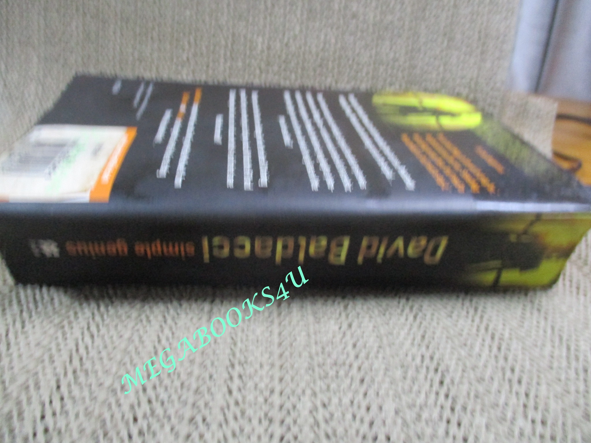Simple Genius - David Baldacci ตำหนิ มีคราบน้ำบริเวณท้ายเล่ม กระดาษไม่ติด