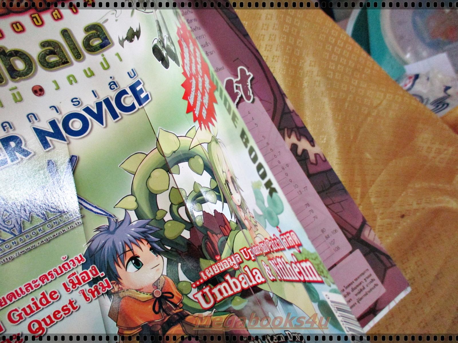หนังสือคู่มือเกมส์ RO UMBALA SUPER NOVICE TECHNIC ตำหนิมีรอยมีดตัดยาวที่หน้าปก ตามรูป