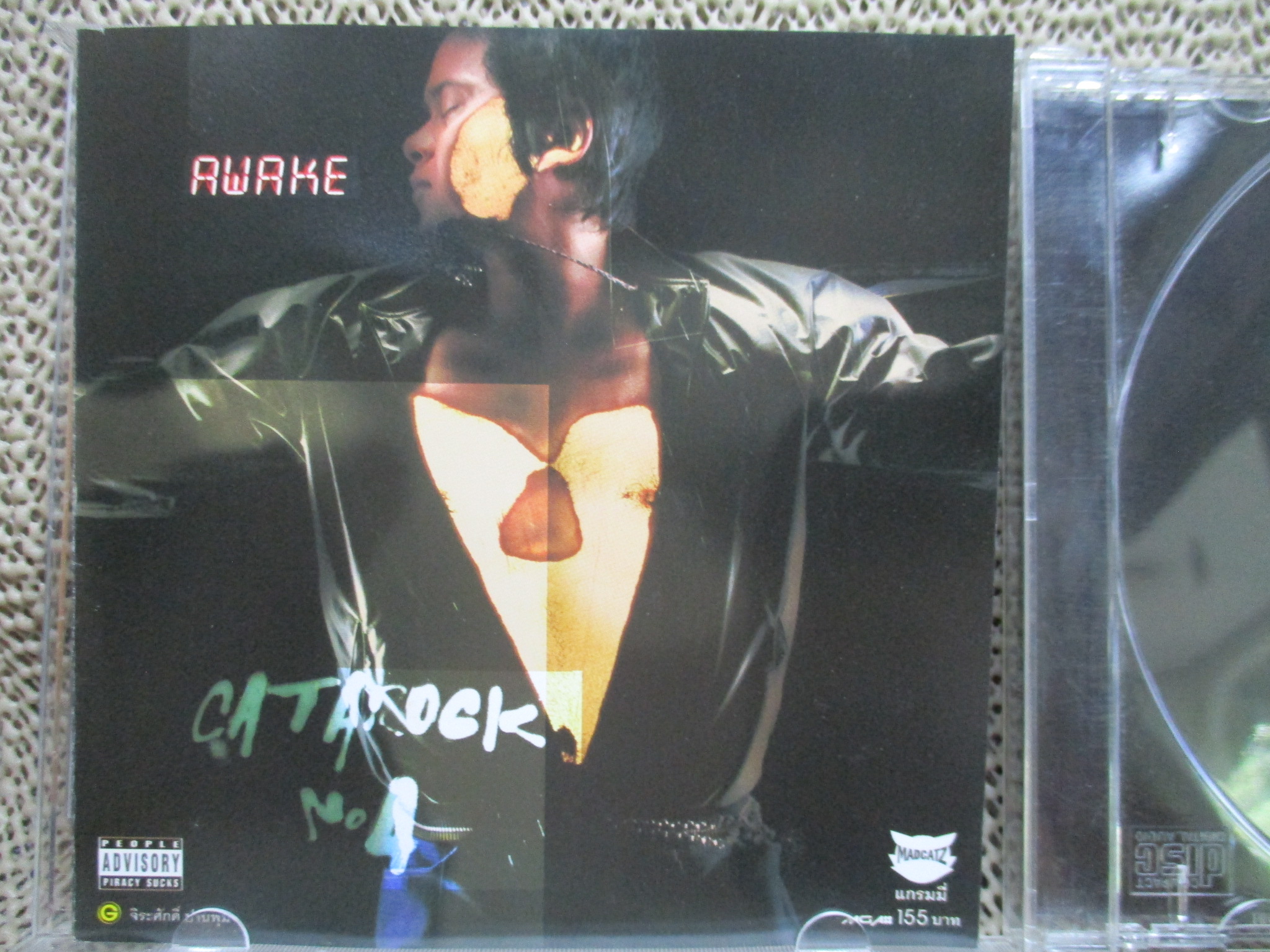 ซีดีเพลงไทยสากล แมว จิรศักดิ์ ปานพุ่ม CATAROCK No.4 AWAKE // ปกสวย แผ่นสวย มีรอยนิดเดียว
