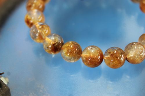 ไหมทองดอกเก๊กฮวย (Golden Mica Rutile Quartz)
