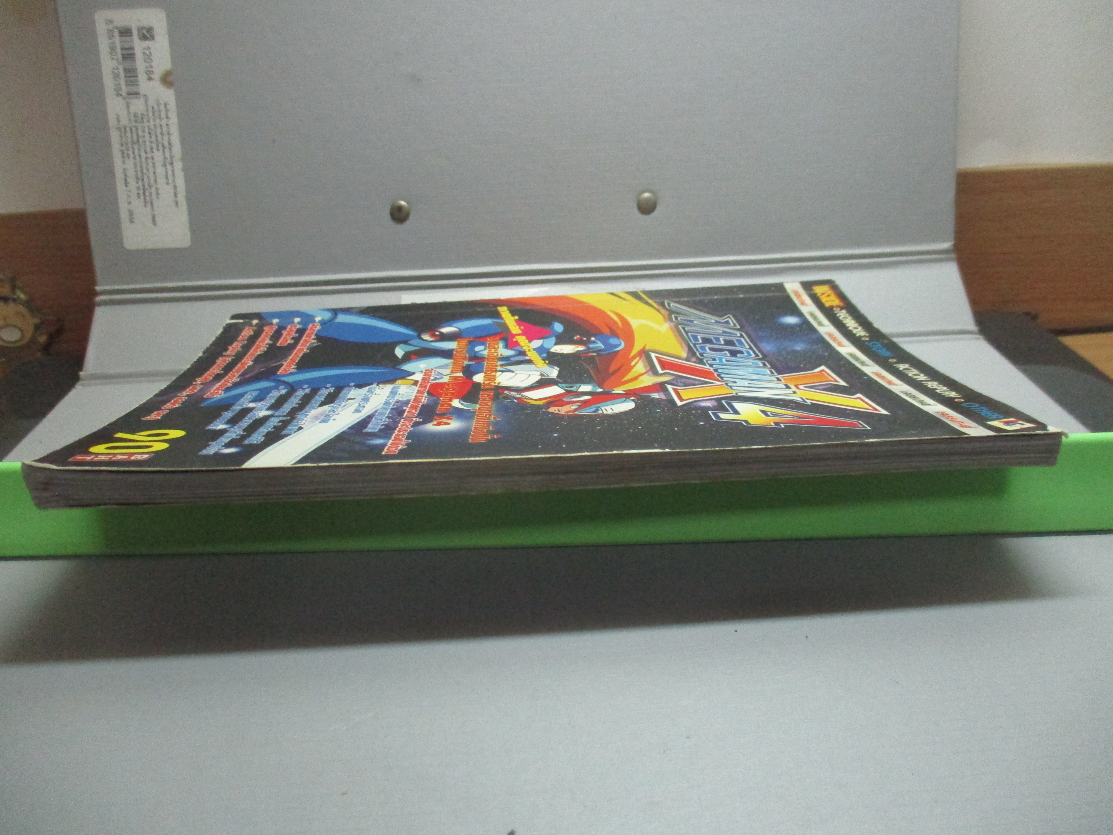 หนังสือคู่มือเฉลยเกมส์ MEGAMAN X4 สภาพเก่าหน่อย
