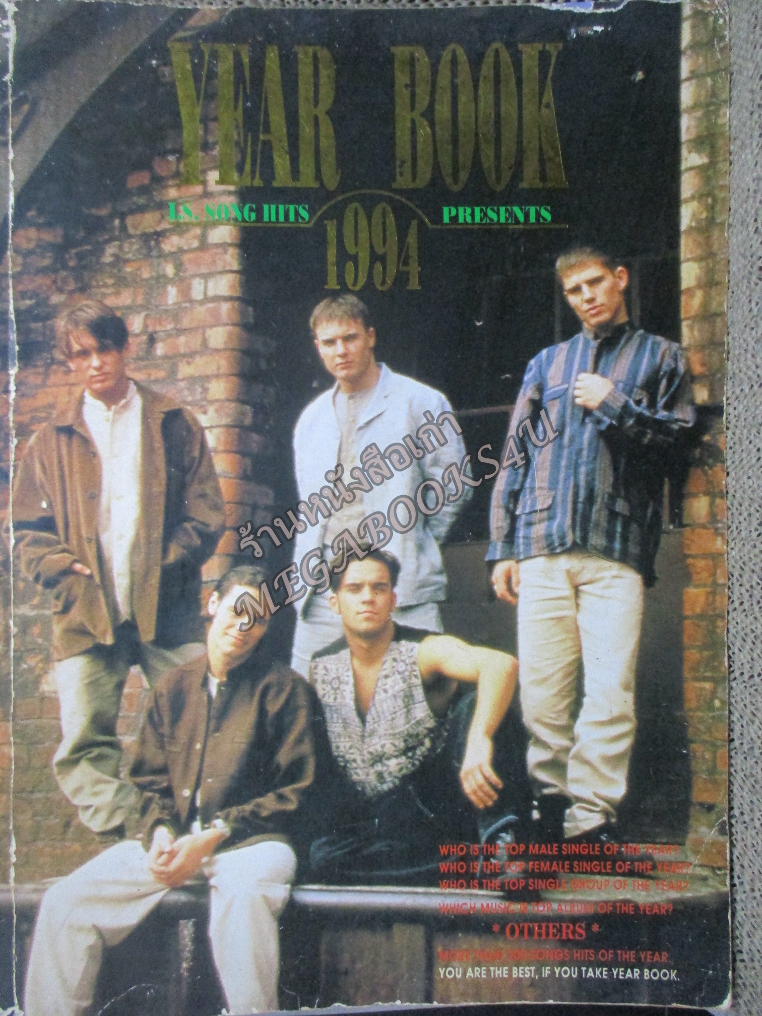 หนังสือเพลงพร้อมคอร์ดกีตาร์ THE GUITAR YEAR BOOK 1994 รอบๆ ปก มีรอยถลอก แหว่ง ประปราย