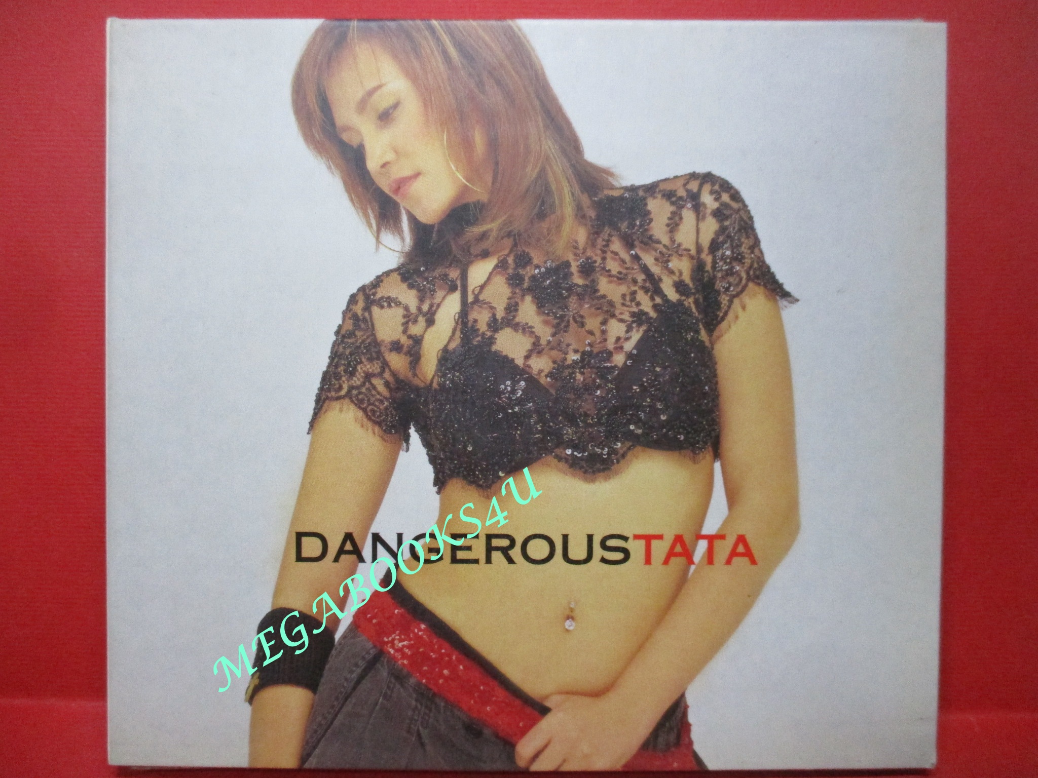 ซีดีเพลงไทยสากล ทาทา ยัง (Tata Young) ชุด Dangerous // ปก และ แผ่นมีรอยเล็กน้อย