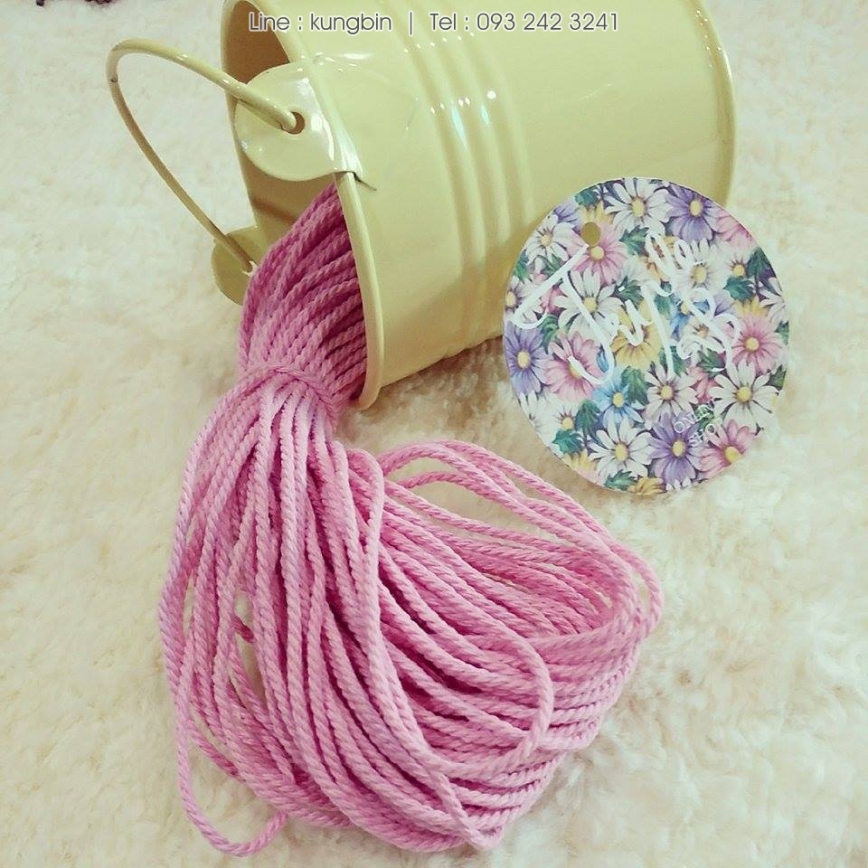 เชือกเส้นใหญ่ ประมาณ 2 มิล สีมพูอ่อน