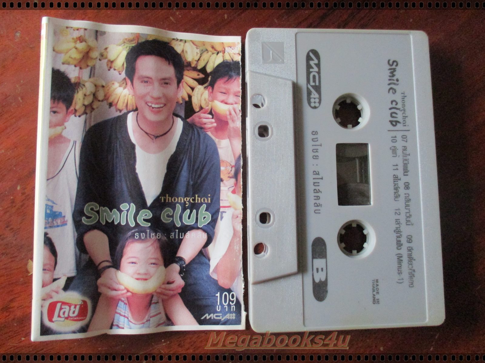 เทปเพลงไทยสากล เบิร์ด ธงไชย แมคอินไตย์ อัลบั้ม SMILE CLUB ตำหนิกระดาษเนื้อหาขาดหลุดตรงรอยพับ