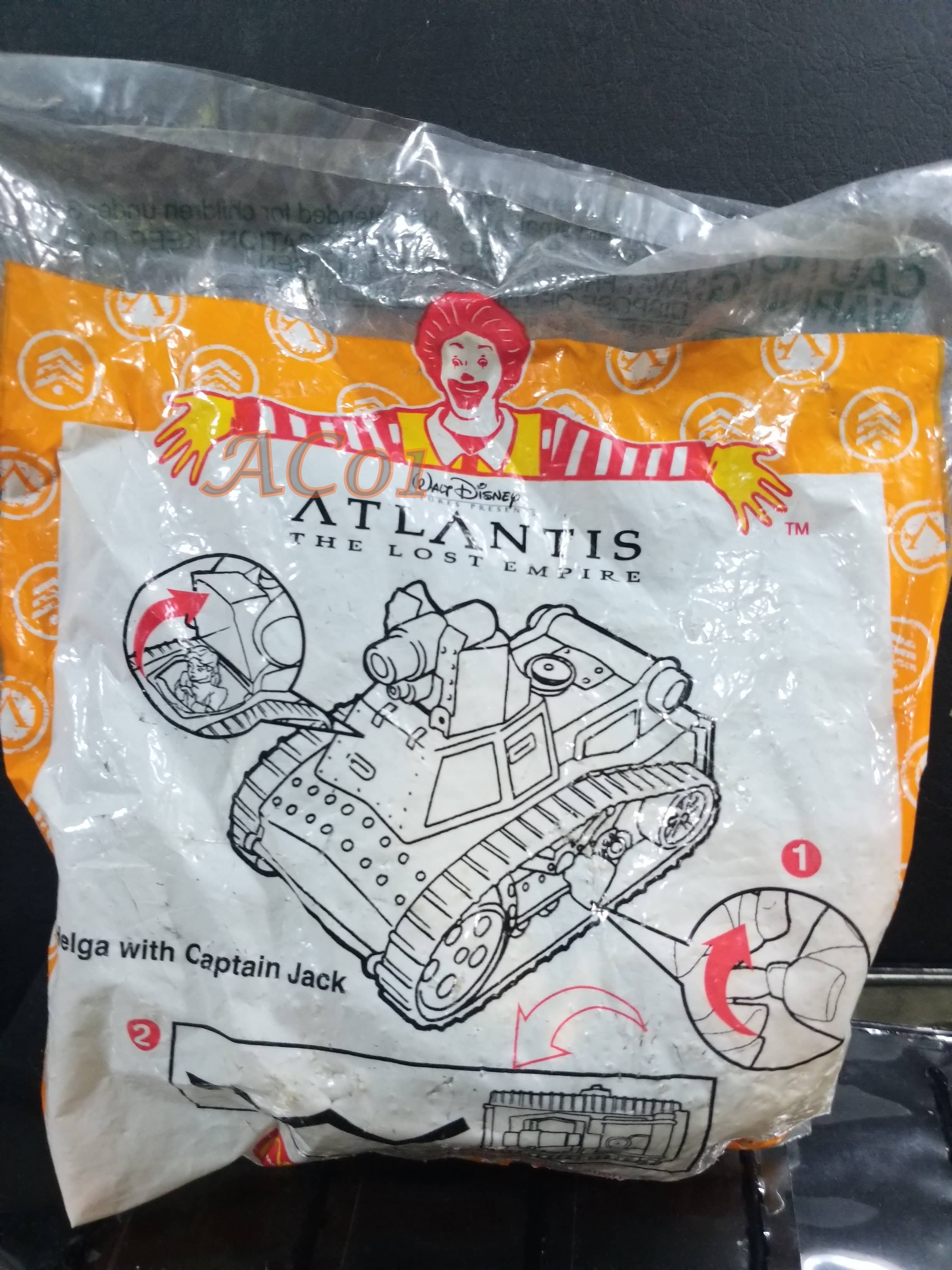 ของเล่นMcDonald's ของเล่นHappy Meal / Atlantis the lost empire - HELGA WITH CAPTAIN JACK / ในถุงเดิม ไม่แกะ ถุงเก่าหน่อย เก่าเก็บ