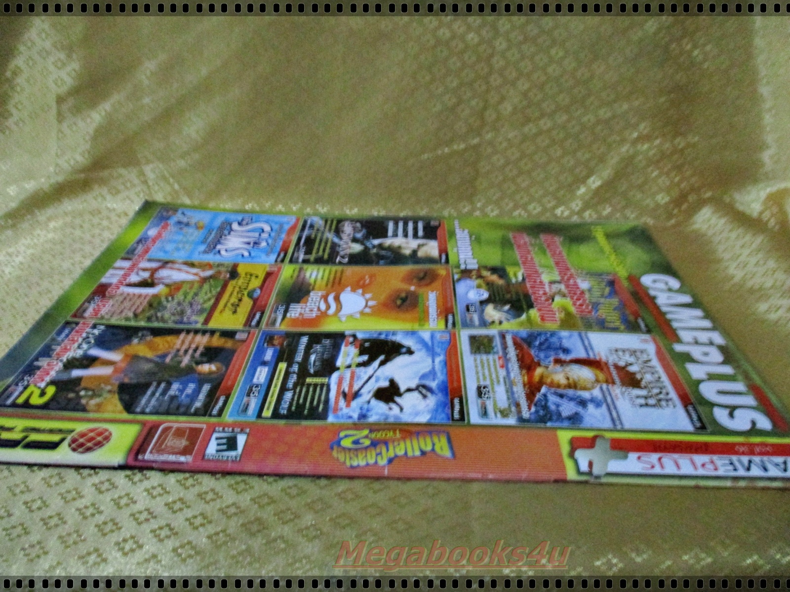 หนังสือคู่มือเกมส์ ROLLER COASTER TYCOON 2