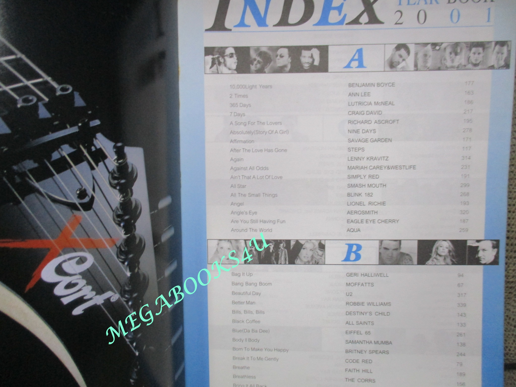 หนังสือเพลงพร้อมคอร์ดกีตาร์ THE GUITAR YEAR BOOK 2001 ตำหนิ มีหน้าแบะออก เจ้าของเดิมติดเทปใส และหยอดกาวไว้ กระดาษจะเหลื่อมกันหน่อยๆ