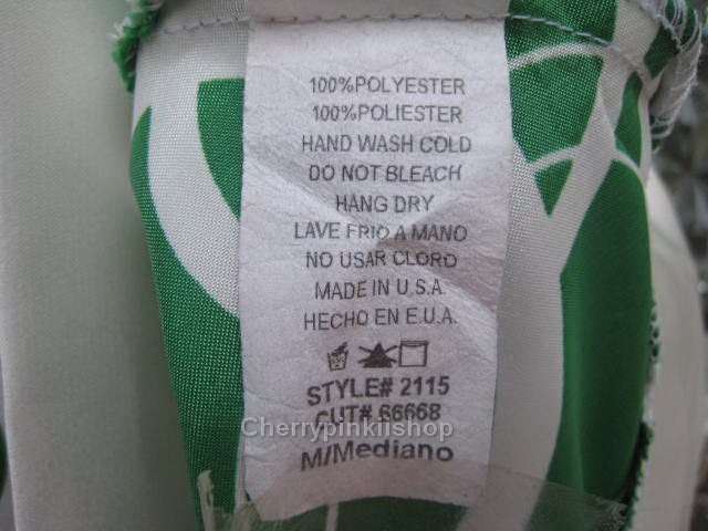 เสื้อแฟชั่นสีเขียวลายวงกลม สายเดี่ยว ผ้ามันลื่น นิ่ม สวยดูดี ผูกโบว์ที่ต้นคอด้านหลัง Made in USA