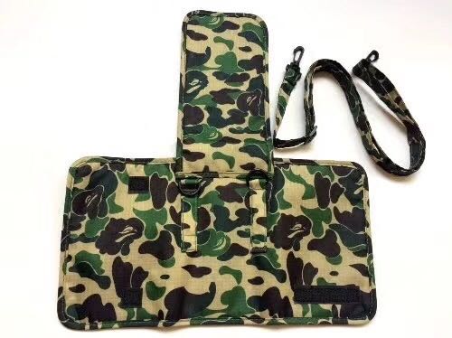 A BATHING APE® 2014 AUTUMN & WINTER COLLECTION กระเป๋าใส่โทรศัพท์ และ Passport มีสายถอดได้