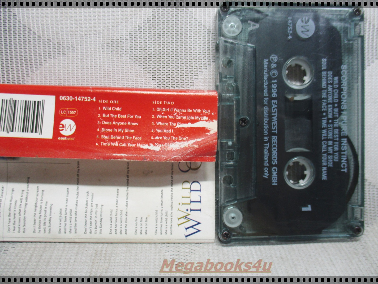 ขายเทปเพลงเก่า SCORPIONS ; PURE INSTINCT กระดาษแผ่นพับด้านในติดกัน