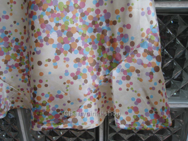 กระโปรงสีครีม Polka dot ลายจุด เนื้อผ้ามันลื่นสวมใส่สบาย พริ้วสวย ยี่ห้อ vivagarcon