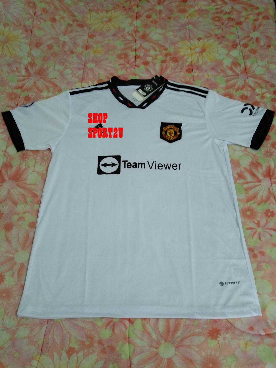 ชุดฟุตบอลแมนยูไนเต็ด เยือน2022-2023