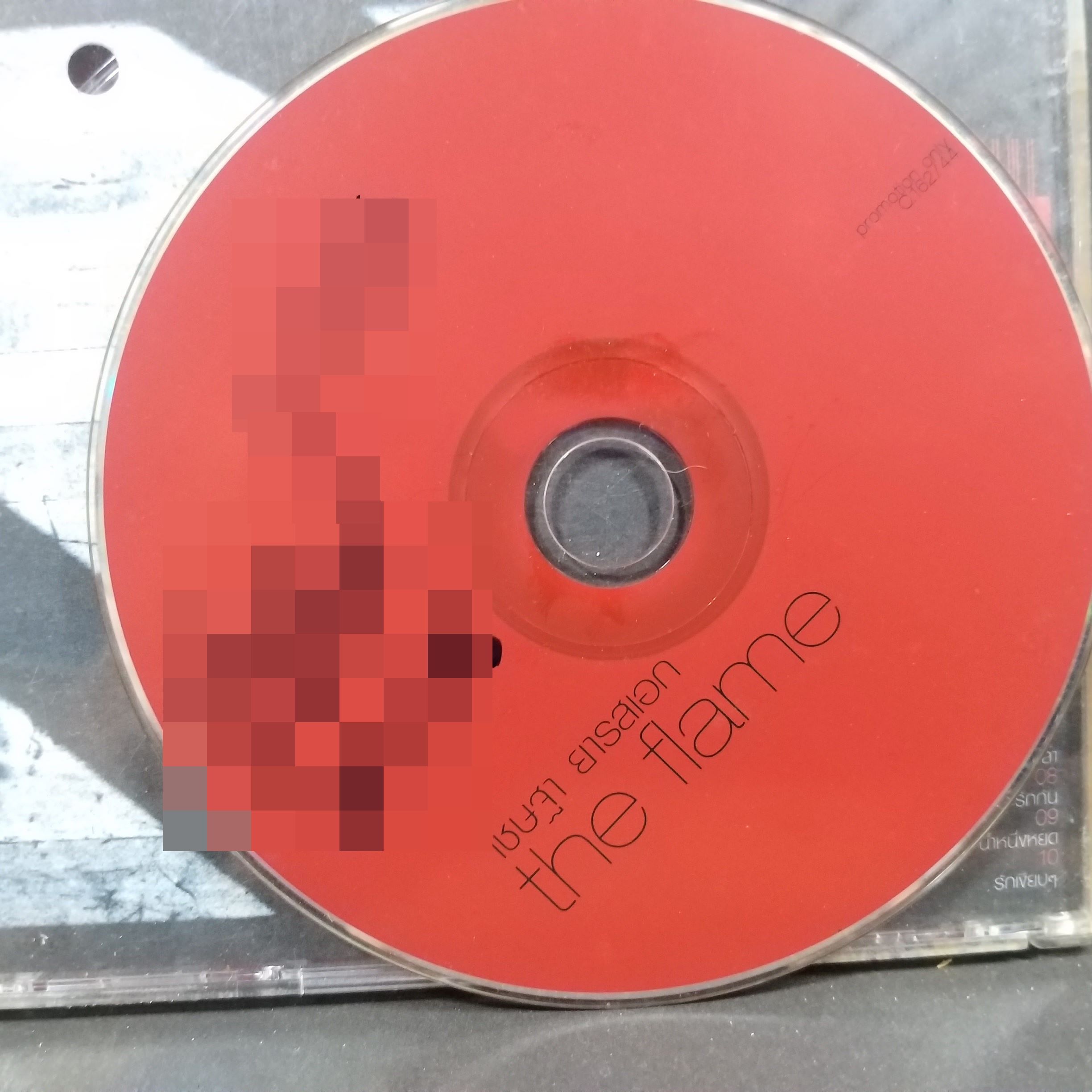 ซีดีเพลงไทยสากล เพลงไทยสากล เชษฐา ยารสเอก อัลบั้ม THE FLAME บรรจุ10เพลง // ปกเจาะ แผ่นสวย มีรอยเล็กน้อย