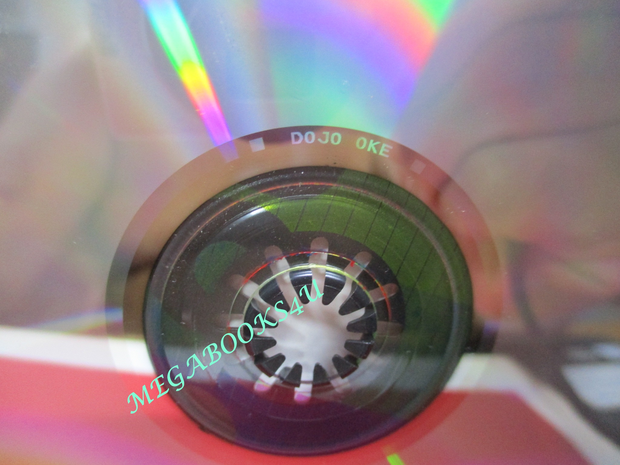 ซีดีเพลงไทยสากล DOJO-OKE รวมเพลงฮิตโดนใจ /// ปกดี แผ่นมีรอยนิดเดียว สำเนา