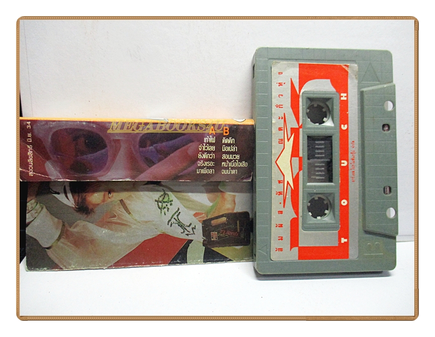 เทปเพลงไทยสากล ทัช ณ ตะกั่วทุ่ง อัลบั้ม ทัชธันเดอร์ (กระดาษปกเทปติดกันมีคราบน้ำ)