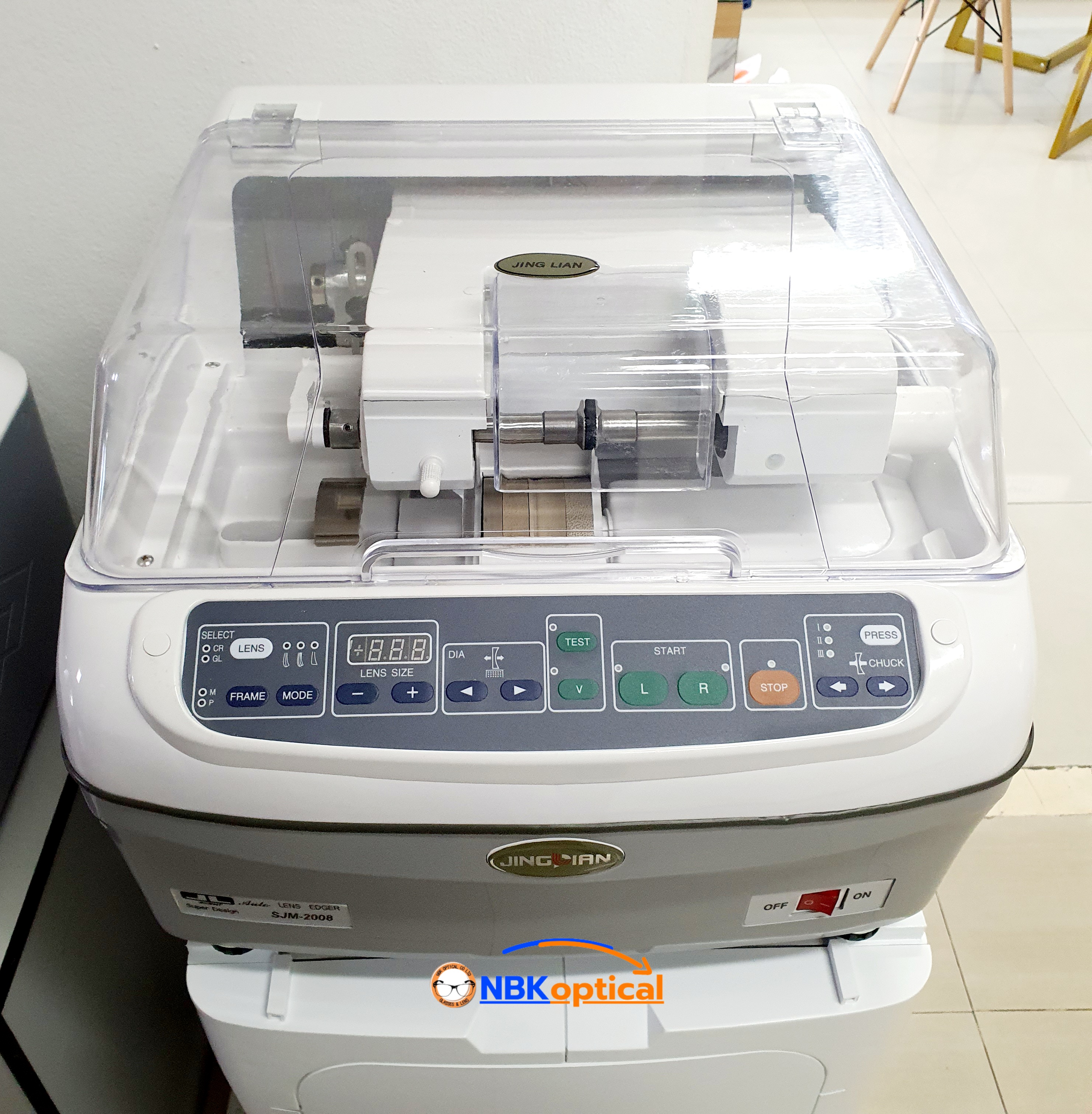 เครื่องฝนเลนส์ออโต้ SJM-2008