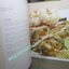 หนังสือ วิธีการปรุงอาหารไทยของดุสิต “Thai Way of Life, The Dusit Cookbook” (ปกแข็ง) ตำหนิ ตัวหนังสือมีคราบน้ำ กระดาษไม่ติด เปิดได้ตามปกติ