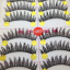 V-085 ขนตาด้ายดำ(ราคาส่ง) ขั้นต่ำ 15 เเพ็ค คละเเบบได้